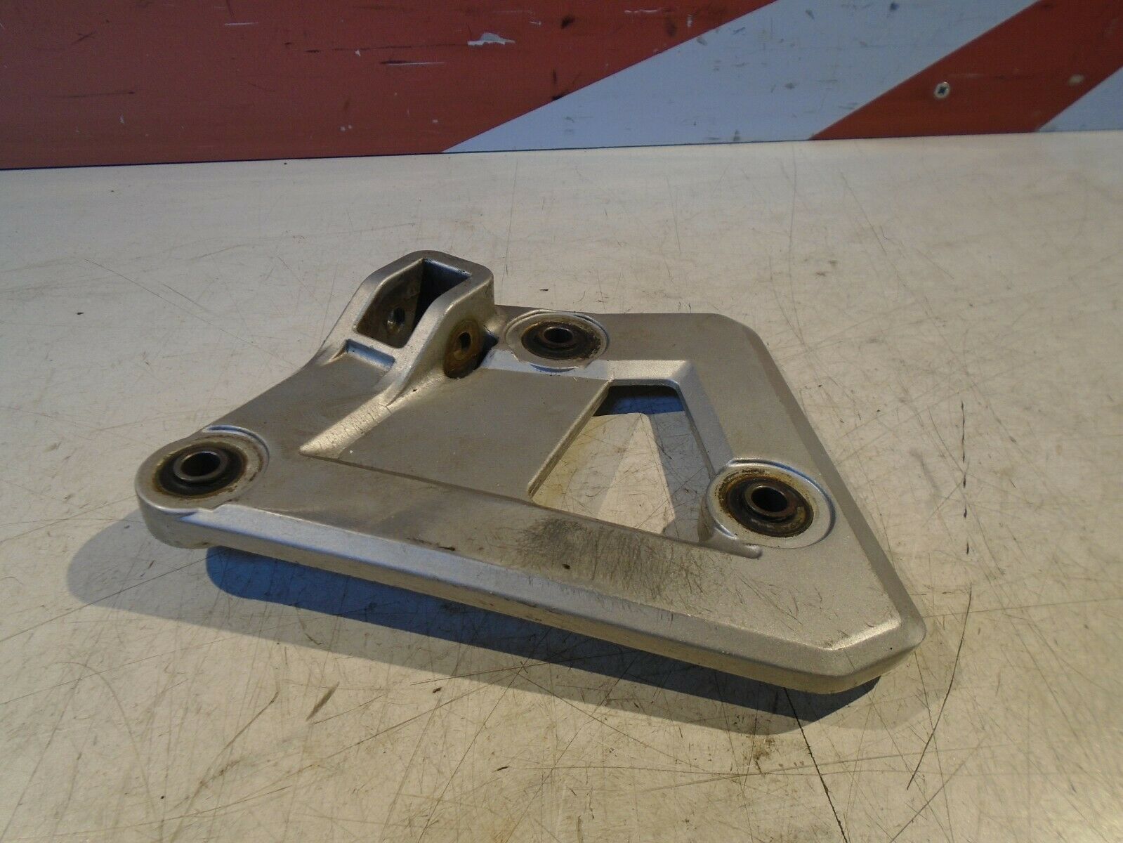 Suzuki GSX750F Front Footrest Hanger 