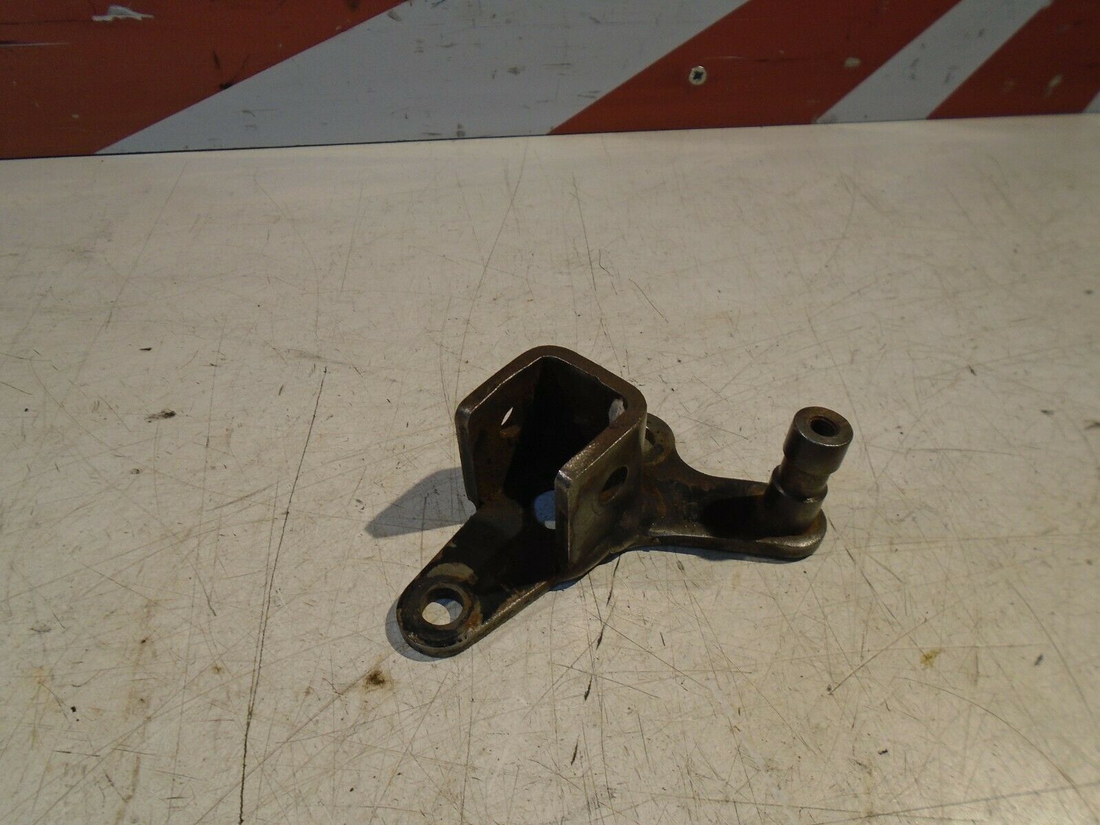 Honda CB125T Front Footrest Mount Bracket