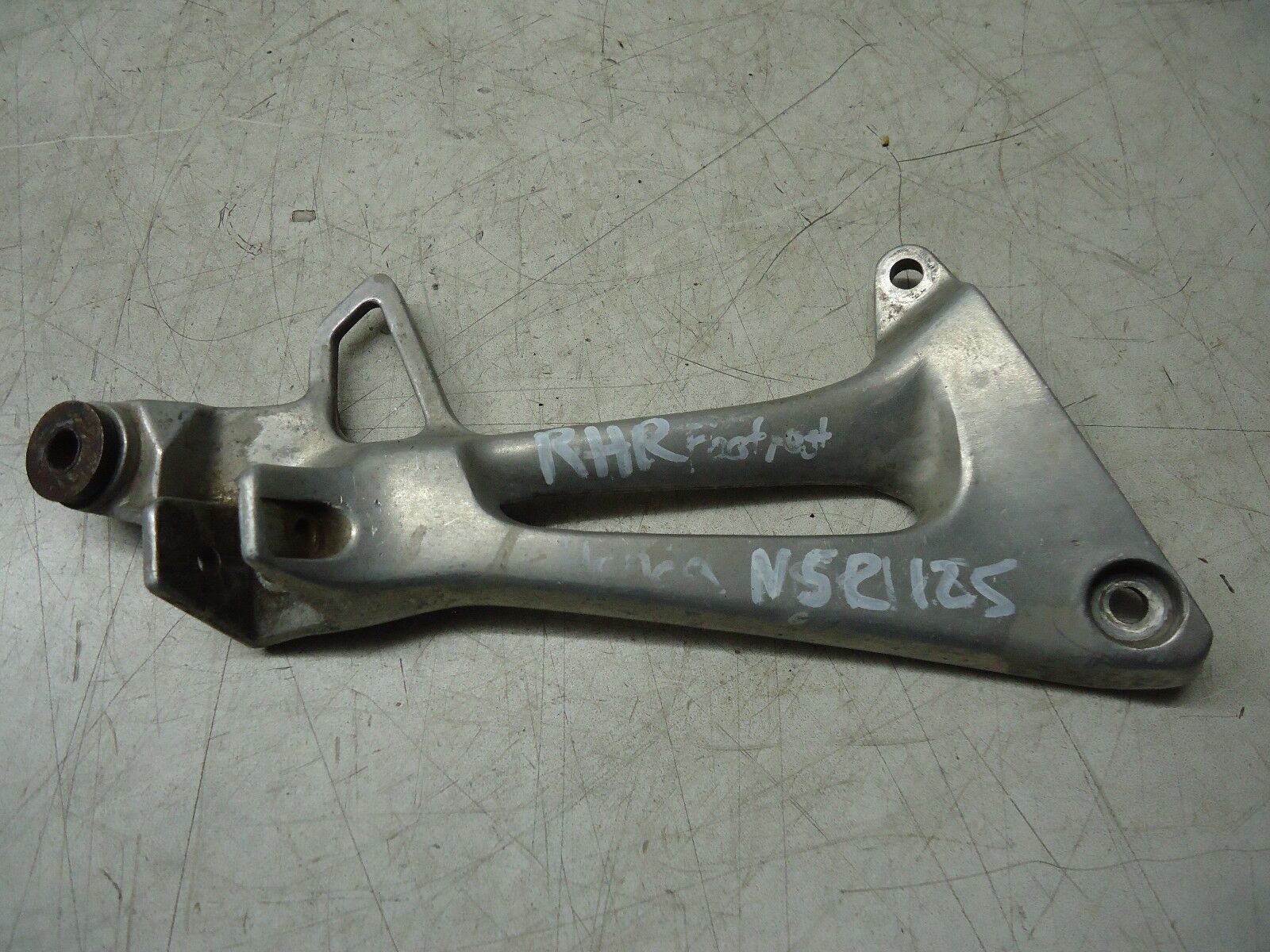 HONDA NSR125 RH REAR FOOTREST HANGER 