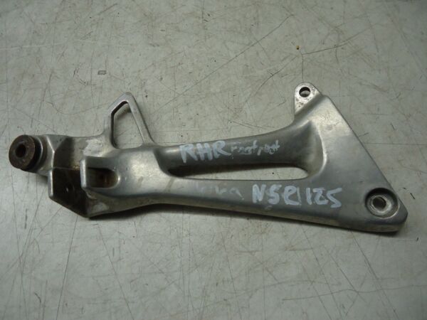 HONDA NSR125 RH REAR FOOTREST HANGER 