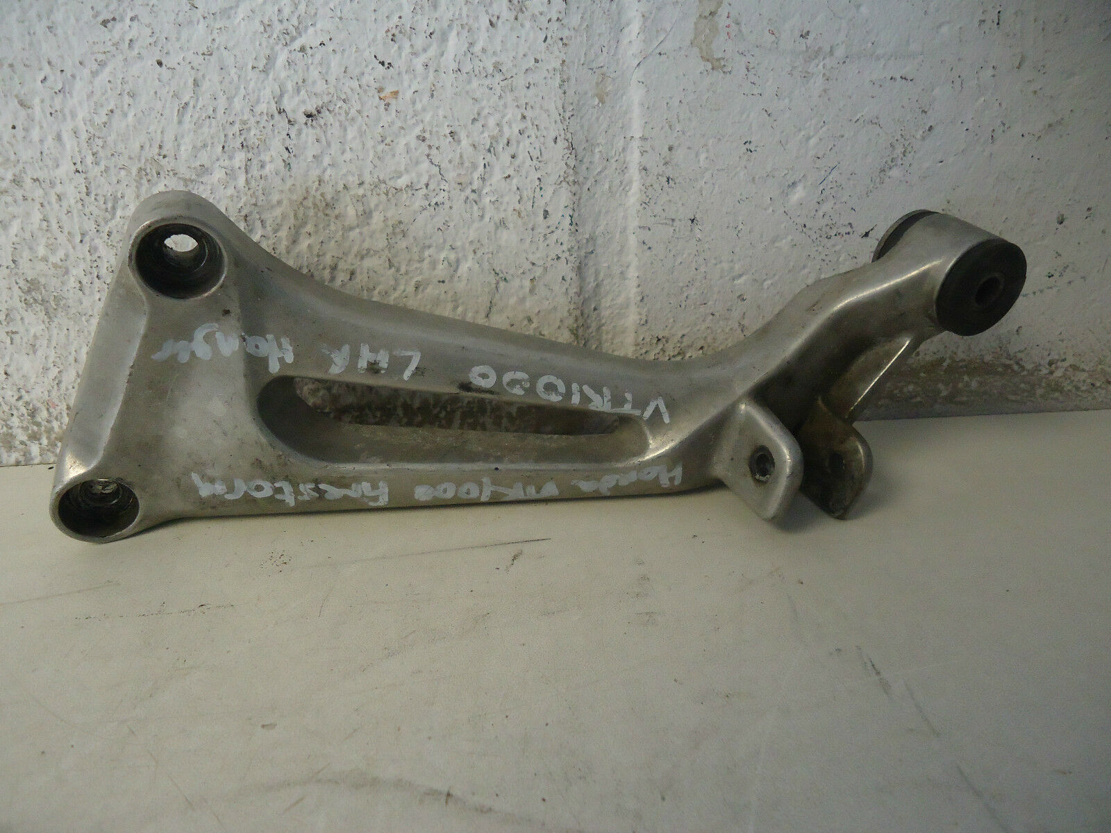 HONDA VTR 1000 LH REAR FOOTREST HANGER 