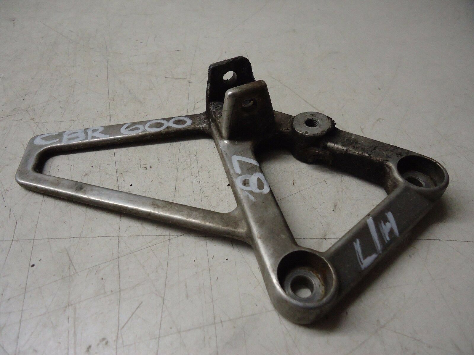 HONDA CBR600F LH FOOTREST HANGER 