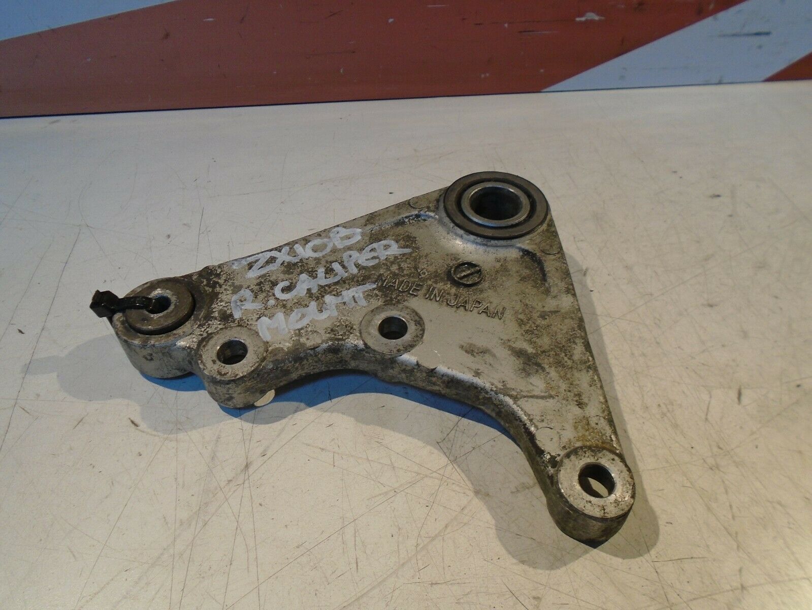 Kawasaki ZX10B Tomcat Rear Brake Caliper Mount Bracket