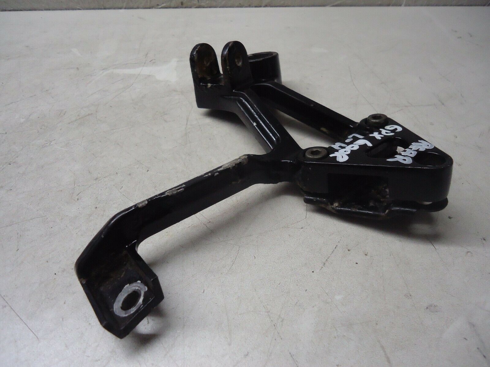 KAWASAKI GPX600R REAR LH FOOTREST HANGER 1988 